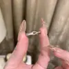 Anillo de Amor de Circonita Super Brillante Nicho de Lujo Ligero para Mujer Estilo ins Sentido del Diseño Avanzado Anillo Abierto para el Dedo Índice Venta al por Mayor