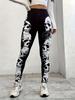 Pantalones de yoga ajustados de estilo europeo y americano con estampado digital 3D en color melocotón para mujer, pantalones deportivos ajustados para correr.