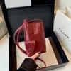 Bolso de teléfono de patrón tejido de moda transfronterizo, nuevo bolso pequeño simple de moda de verano 2026, bolso de hombro cruzado de alto valor estético