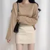 Falda de lana para mujer para otoño e invierno, minifalda negra de cintura alta, nuevo modelo 2026, falda de línea A adelgazante, moderna