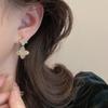 Pendientes de trébol con incrustaciones de diamantes, pendientes femeninos de nicho, únicos, ligeros, de lujo, de alta calidad, nueva joyería popular para las orejas 2024