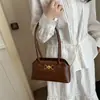 Bolso de Mano Boston Versátil Retro para Mujer 2026 Verano Nuevo Estilo Bolso de Hombro Cruzado Casual de Gama Alta con Estilo