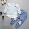 Ropa Infantil de Cuello Redondo para Niños y Niñas, Primavera 2026, Conjunto de Dos Piezas de Sudadera y Pantalón Largo para Bebés y Niños, Ropa Infantil Estilo Coreano, Al Por Mayor