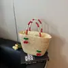 2025 Nuevo Bolso de Mano Tejido de Cerezas para Mujer Bolso de Playa para Vacaciones Bolso Cruzado Cubo Tejido Hueco para Vacaciones en la Playa