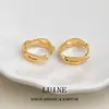 Pendientes geométricos de cruz circular, a la moda, sencillos, de lujo ligero, para mujer, versátiles para ir al trabajo, estilo nuevo, accesorios de fábrica de pendientes de Yiwu