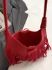 Bolso de hombro personalizado estilo coreano para mujer, nuevo modelo de verano 2026, bolso de mano y bolso de axila de gran capacidad con borlas, moderno y a la moda