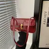 Bolsa de Mão Moderna Estilo Francês 2025 Novo Fecho Moda Retrô Axilar Elegante de Ombro Único para Mulheres Bolsa Quadrada Pequena