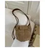 Bolso Pequeño Transfronterizo para Mujer 2025 Nuevo Bolso de Cubo Retro Esmerilado Diseño Nicho de Alta Gama Bolso Bandolera de Hombro Único para Axila