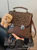 Mochila Estampa de Leopardo Feminina 2025 Nova para Estudante Universitário Viagem Diária Bolsa Escolar Pequena Leve Mochila Feminina para Viagem e Trajeto