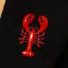 Broche de aleación estilo vacacional transfronterizo europeo y americano en la playa y el océano, personalizado con goteo de aceite de langosta y cangrejo rojos