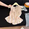Blusa sin mangas floral dulce y elegante estilo francés para mujer, nueva moda de verano, reduce la edad, impresionante blusa babydoll, top estiloso