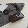 Bolsa Sela Preta Design de Nicho Coreano Nova Bolsa Feminina Primavera 2025 Textura Simples de Alto Padrão Bolsa de Ombro para Motociclista