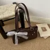 Design Moderno Doce-Legal Tendência Garota Popular Estilo Motociclista Renda Laço Grande Capacidade Bolsa de Ombro Sob o Braço Baguete