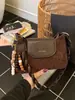 Otoño e Invierno 2025 Diseño de Nicho Color Contrastante Nuevo Bolso de Moda para Mujer Estilo Retro Bolso de Axila Bolso Personalizado de Hombro en Forma de Media Luna