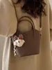 2026 Bolsa Casual da Moda Estilo Novo com Textura Simples e Moderna, Bolsa Saco para Inverno, Bolsa de Ombro e Transversal Personalizada para Mulheres