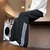 Pantalones Largos Casuales Sueltos de Otoño para Hombre 2026 Nuevo Estilo Pantalones Deportivos de Pierna Ancha Recta Tendencia para Hombre