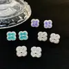 Pendientes de Botón de Trébol de Cuatro Hojas de la Suerte con Diamantes Completos de Alta Calidad para Mujer Pendientes de Flor de Trébol de Cuatro Hojas de Circonita Exquisitos de Lujo Ligero 2026 Nuevo Más Vendido