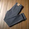 Pantalones de algodón sarga gruesos para hombre Otoño e Invierno, amigables con la piel, cómodos, microelásticos, de cintura media, corte recto, grises, pantalones casuales de negocios