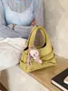 Bolso Cesta Transfronterizo Sencillo con Patrón de Lichi para Mujer 2026 Primavera Nuevo Bolso Cubo de Moda Gran Capacidad Bolso de Hombro Cruzado