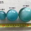 Venta al por mayor de fábrica de adornos coloridos de ojo de gato, adornos para sala de estar, juego de balonmano, piedra de ojo de gato, bola de cristal, bola de Feng Shui