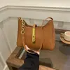 Bolso de diseñador de nicho estilo coreano para mujer, nuevo modelo primavera-verano 2026, bolso de mano texturizado, bolso de hombro versátil y moderno