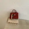 2026 Novo Estilo Simples e Moderno Fivela de Fecho Estilo Coreano Bolsa Transversal de Ombro Bolsa Quadrada Pequena para Mulheres Bolsa Feminina Casual Retrô