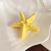 Pinza para el Cabello de Estrella de Mar Amarilla para Mujer 2026 Nuevo Estilo Pinza para Flequillo Lateral Estilo Vacaciones de Verano en la Costa Pinza de Pato Pasador Accesorio para el Cabello