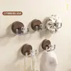 Gancho doble redondo con textura de madera de ventosa, gancho creativo para el hogar de doble cabeza sin perforaciones, gancho de ventosa simple para entrada y dormitorio