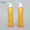 Botella con Bomba de Presión de 270ml, Botella con Forma de Cintura para Aceite Limpiador, Botella Limpiadora Cosmética para Mascotas, Botella Vacía de Plástico Amarillo Translúcido