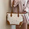 Bolsa de mão de grande capacidade para mulheres, nova moda primavera 2026, bolsa de ombro simples, bolsa tote estampada fofa para o dia a dia