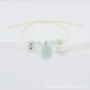Bestseller transfronterizo: flores reales, flores secas, gypsophila, pulseras tejidas hechas a mano, joyería de cerámica de Jingdezhen, estilos de puestos en lugares escénicos