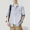 Nueva camisa de manga corta a rayas fina para hombre de verano 2026, camisa polo casual de manga corta holgada para hombre Camiseta