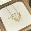 Collar de acero de titanio con colgante de doble mariposa de estilo coreano, de ensueño, para mujer, incrustado con circonita, cadena versátil y lujosa para la clavícula, joyería transfronteriza