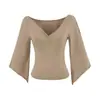 Elegante conjunto de top de cuello en V profundo con mangas de agua estilo europeo y americano, nuevo otoño 2026 falda irregular de cintura alta adelgazante