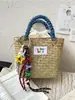 Bolso de Mano de Bloques de Color Estilo Coreano 2026 Bolso de Cesta de Paja Bolso Tejido a Mano para Vacaciones en la Playa Bolsos para Mujer