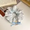 Primavera Verano Pequeño Fresco Rayas Azules Lazo Anillo Intestino Pinza para el Cabello Elegante Sensación de Alta Gama Cráneo Alto Diadema para Niña Femenina