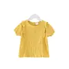Ropa de Verano para Niños 2025 Blusa para Niñas Estilo Coreano con Borde de Volantes Tops de Manga Corta de Moda para Niñas Venta al por Mayor desde Fabricante