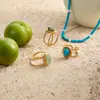 Anel de Aço Titânio Wanxing Europeu e Americano Transfronteiriço com Incrustação de Turquesa Azul, Joia de Aço Inoxidável Dourado 18K, Não Desbota, Design Estiloso