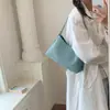 Bolso Tejido de Nicho Súper Popular para Mujer Modelo Nuevo 2026 Bolso Versátil de Hombro para el Traslado Bolso Tote Pequeño Bolso Cubo