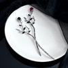 Horquilla de metal plateado con forma de rosa para mujer, estilo chino de alta gama, diseño único