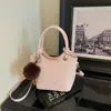 Bolso de mano estilo coreano para mujer, nuevo modelo principios de otoño 2026, bolso de cubo con estampado de leopardo de alta costura, nicho, para hombro