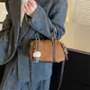 Bolsa Boston nicho nova bolsa de mão tipo camurça travesseiro para o trabalho retrô 2026 bolsa transversal para mulheres design