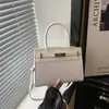 Bolso de mano para mujer, nueva colección otoño 2026, moderno y a la moda, elegante y atractivo, bolso de hombro, bolso cruzado, bolso cuadrado pequeño