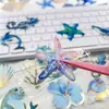50 Peças de Adesivos para Diário com Estampagem Dourada com Criaturas Marinhas de Desenho Animado, Golfinhos, Baleias e Estrelas-do-Mar para Decoração DIY em Garrafas de Água e Guitarras
