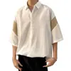 Nueva camisa de verano para hombre de cinco puntos con manga corta, bloques de color, lujo ligero, corte holgado, seda helada fresca y una bonita caída