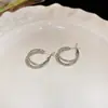 Pendientes llamativos, únicos y de alta gama, nuevo estilo 2026, adelgazantes, elegantes pendientes de aro, diseño coreano, pendientes de botón de plata.