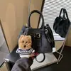Bolso Cubo de Mano de Alta Gama Estilo Coreano Transfronterizo para Mujer 2026 Nueva Moda Versátil Textura de Alta Calidad Bolso de Hombro Cruzado