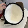 Sombrero Coreano al por Mayor Bloque de Color Tejido de Lana Sombrero Cubo Otoño e Invierno Cálido Cúpula Declaración Forma de Campana Sombrero de Pescador