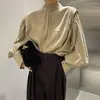 Corea del Sur chic otoño estilo francés cuello alto medio diseño de botón trasero sentido de diseño moda nicho blusa top de manga farol para mujer