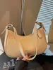 Bolso de moda tipo medialuna estilo coreano para mujer, nuevo bolso de mano casual de nicho primavera 2026, bolso de hombro de moda, bolso de axila para damas